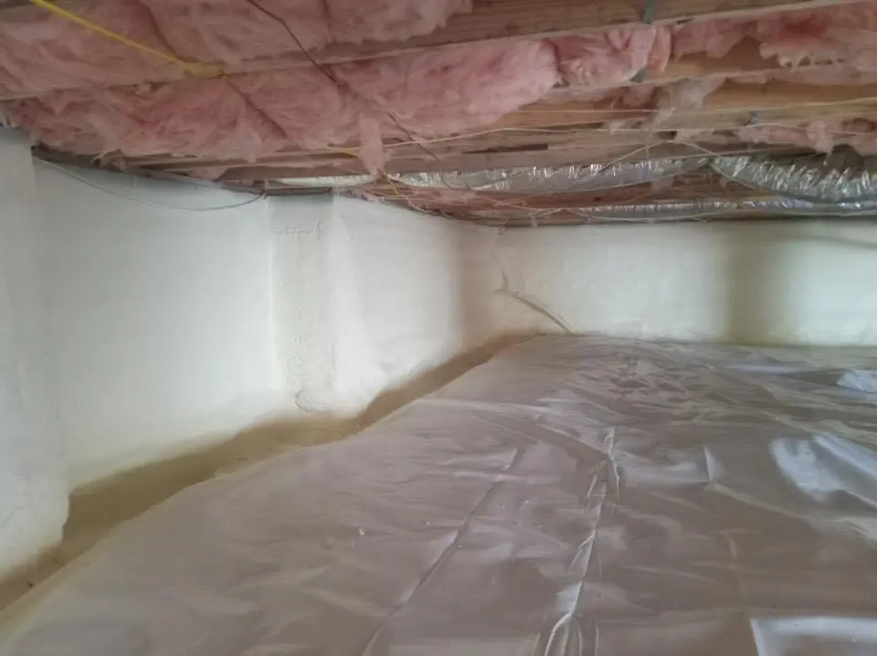 Crawl space encapsulation with closed-cell spray foam for Commercial Roof Restoration in Woodbury